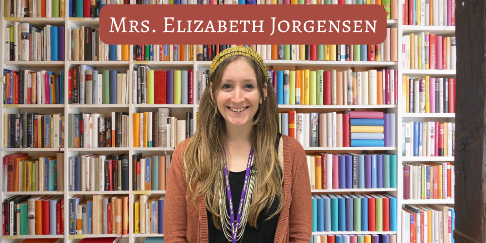 Mrs. Jorgensen photo in front of book background